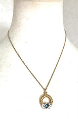 Vintage LANVIN golden skinny chain necklace with golden round pendant top. Clear crystals and green glass stone. Perfect jewelry gift.