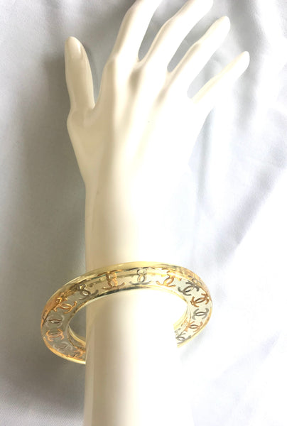 Vintage CHANEL resin bangle, bracelet with gold and silver CC marks. O –  eNdApPi ***where you can find your favorite designer vintages..authentic,  affordable, and lovable.