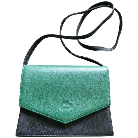 Vintage Longchamp shoulder bag with 3 changeable flaps in black, green, and red. For unisex use, daily bag.