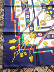 Vintage HERMES Carre navy silk scarf with yellow, pink, green, and multicolor medal and princess etc print. Beautiful foulard.  Petite main.