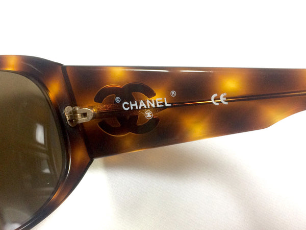 Vintage CHANEL brown frame sunglasses with large CC charms at sides. M –  eNdApPi ***where you can find your favorite designer  vintages..authentic, affordable, and lovable.