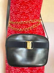 Vintage Salvatore Ferragamo dark navy leather shoulder bag with golden logo embossed motif from vara collection. Classic purse.