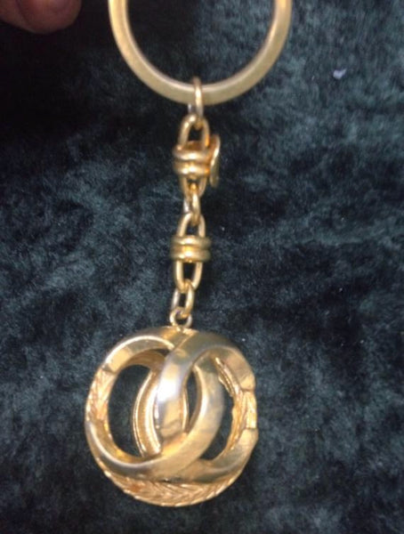 Vintage CHANEL gold tone round Sphere CC key chain with CC marks. Grea –  eNdApPi ***where you can find your favorite designer  vintages..authentic, affordable, and lovable.
