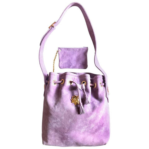 Vintage Christian Lacroix purple suede leather hobo bucket shoulder bag with drawstrings and golden sun, heart etc.. motifs. Unique and chic.