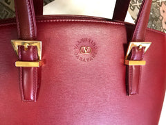 Vintage Valentino Garavani wine leather handbag with golden buckles. Classic Valentino purse for any occasions.