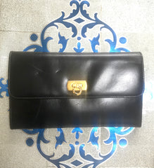 Vintage Salvatore Ferragamo Gancini black leather wallet with gold tone closure. Classic purse.