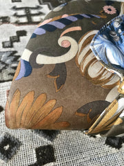 1980s. Vintage Gucci khaki brown tone flora printed satin fabric half moon shape clutch bag. Multicolor flower prints. Masterpiece Gucci bag by Accornero collection back in the old era.