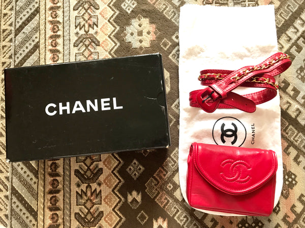 Vintage CHANEL red leather belt bag, fanny pack with detachable chain belt  and CC stitch mark on flap. Fits 29.5 through 32.8