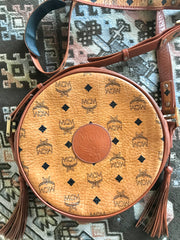 Vintage MCM brown monogram round Suzy Wong shoulder bag with brown leather trimmings. Designed by Michael Cromer. Classic masterpiece bag.