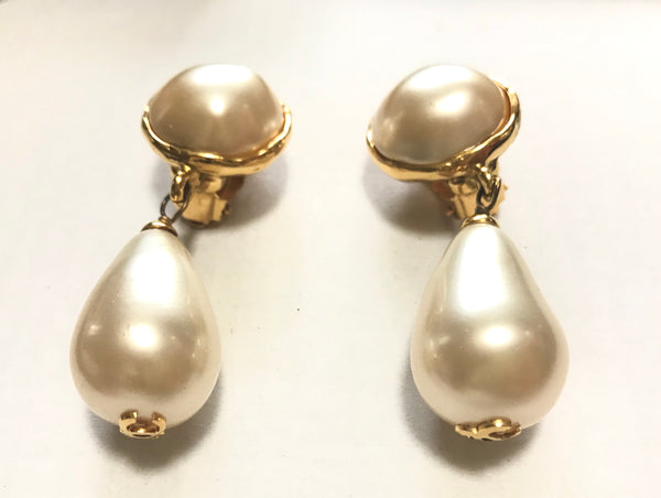 Vintage CHANEL teardrop white faux pearl earrings with golden CC mark on  top. Chanel earrings that dangle as you move. Hot gift.