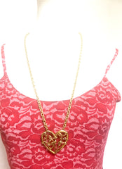 Vintage Moschino golden chain necklace with large arabesque heart design pendant top. Moschino BIJOUX jewelry.