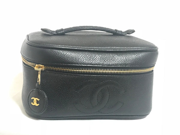 Vintage CHANEL black caviar leather cosmetic, makeup and toiletry purse.  Very chic vanity purse from Chanel back in the era.