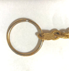 Vintage CHANEL gold tone arabesque clover, flower shape CC key holder, key chain. Great vintage gift.