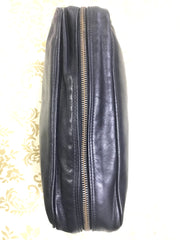 Vintage Gianni Versace black leather purse pouch, case bag with its iconic medusa face and golden logo motif charm. Unisex bag.