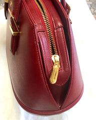 Vintage Valentino Garavani wine leather handbag with golden buckles. Classic Valentino purse for any occasions.