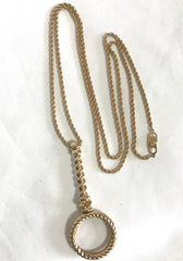 MINT. Vintage Christian Dior long chain necklace with round glass loupe pendant top and CD motif. Rare and gorgeous masterpiece.