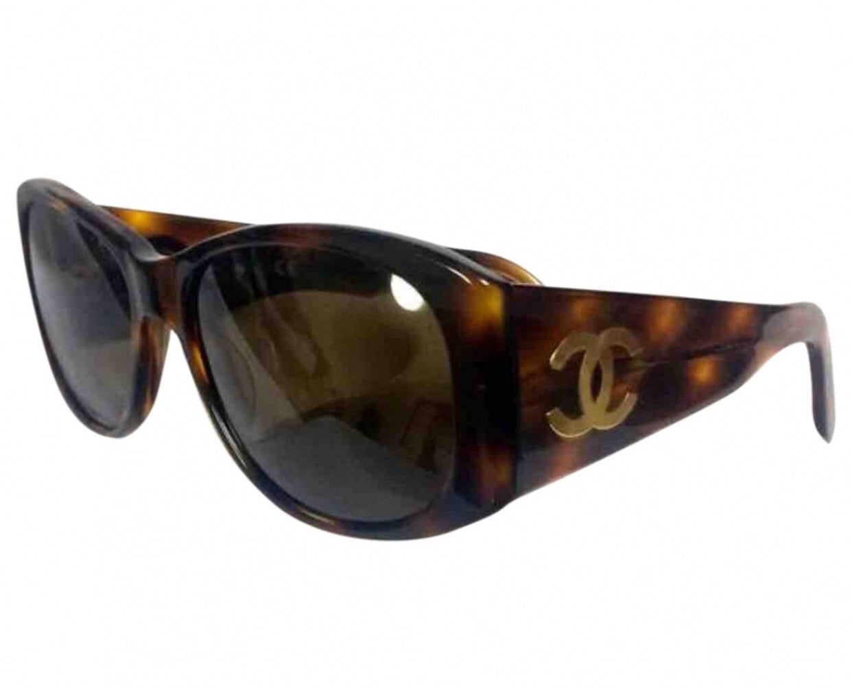 Vintage CHANEL brown frame sunglasses with large CC charms at sides. Mod and chic eyewear you must get.