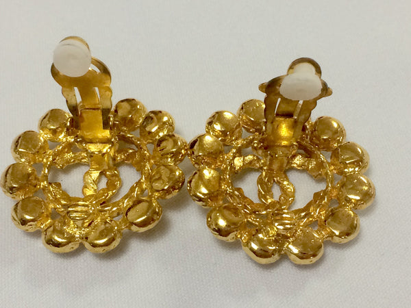 Vintage CHANEL golden sunflower motif twisted CC mark earrings with Sw –  eNdApPi ***where you can find your favorite designer  vintages..authentic, affordable, and lovable.