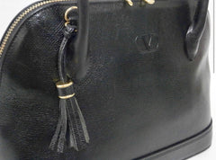 Vintage Valentino Garavani black leather bolide bag with shoulder strap, V logo, a fringe. Classic dialy use purse.