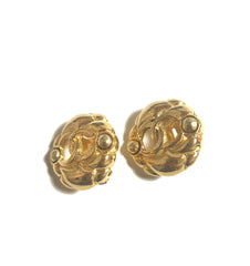 Vintage CHANEL gold tone round earrings with CC mark. Classic vintage Chanel jewelry.