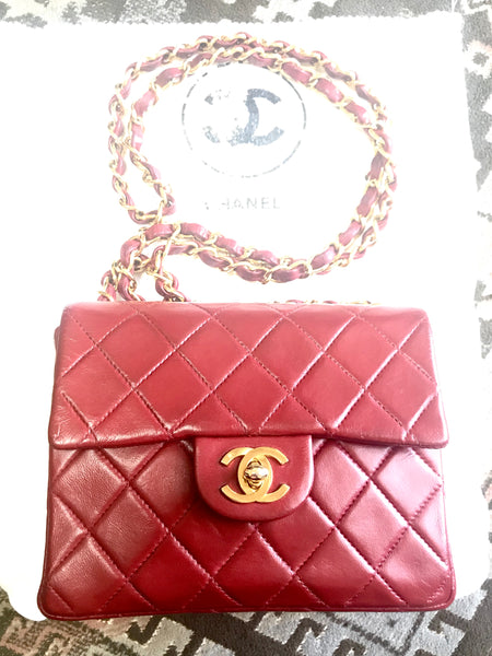 Vintage CHANEL deep red lambskin mini 2.55 bag with golden CC and
