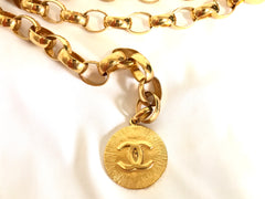 Vintage CHANEL golden chain belt with large CC motif charm. Nice and heavy, rare and Gorgeous accessory.