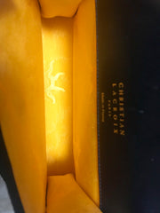 Vintage Christian Lacroix black patent enamel and nylon combo clutch bag with a sun flower shape logo motif.