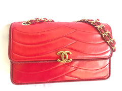 Vintage Chanel red 2.55 shoulder bag with wavy stitches and rope strings and gold chain strap. Very rare piece from the era. 050316r4