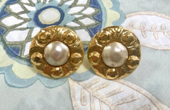 Vintage CHANEL gold tone large round earrings with faux pearl. Classic jewelry.