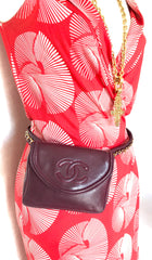 Vintage CHANEL wine fanny pack, leather belt bag with detachable chain belt and CC stitch mark on flap.  Fits 29.5" -32.6"