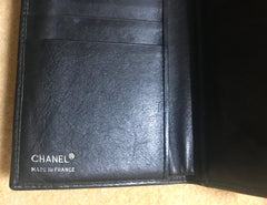 Vintage CHANEL black leather wallet with large CC stitch mark. Rare wallet from Chanel in 90’s.