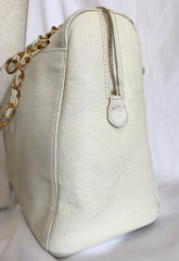 Vintage CHANEL white color caviar leather chain shoulder large tote bag with gold-tone chain handles and large CC stitch mark.