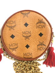Vintage MCM brown monogram mini Suzy Wong chain shoulder purse with red fringes. Designed by Michael Cromer. Rare purse.