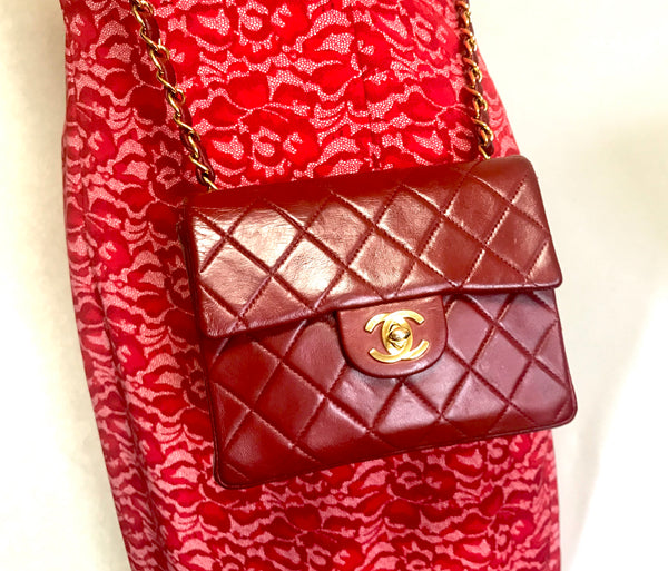 Vintage CHANEL deep red lambskin mini 2.55 bag with golden CC and
