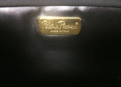 Vintage Paloma Picasso black canvas and leather combo shoulder bag with golden A B C D E F and S T V X Y letter print.