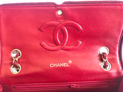 Vintage Chanel red 2.55 shoulder bag with wavy stitches and rope strings and gold chain strap. Very rare piece from the era. 050316r4
