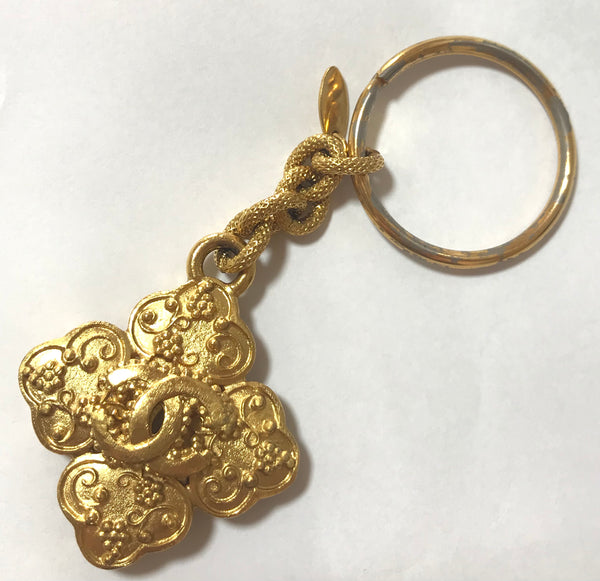 Vintage CHANEL gold tone arabesque clover, flower shape CC key holder, – eNdApPi  ***where you can find your favorite designer vintages..authentic,  affordable, and lovable.