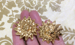 MINT. Vintage CHANEL lion design golden earrings with CC marks around lion face.