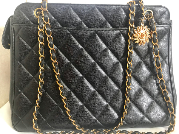 Vintage CHANEL black caviar matelasse chain shoulder bag with golden sun  flower CC mark charm. Classic daily use bag.050315r5