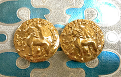 Vintage CHANEL lion, logo, and CC mark engraved golden round earrings. Beautiful  Chanel jewelry piece.