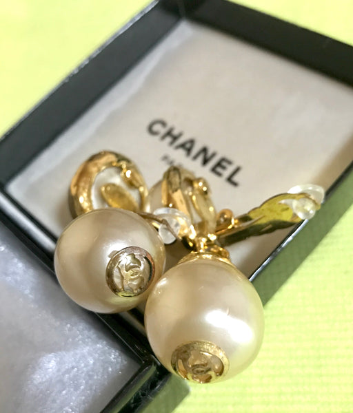 Vintage CHANEL large white faux pearl dangle earrings with golden