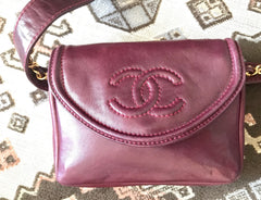 Vintage CHANEL wine fanny pack, leather belt bag with detachable chain belt and CC stitch mark on flap.  Fits 29.5" -32.6"