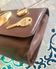 Vintage MOSCHINO brown leather purse, can be fanny bag, clutch bag with large golden heart and key motifs. So chic and mod