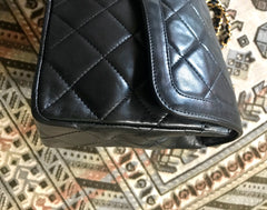 OFV 20210526 Vintage Chanel black lamb 2.55 double flap chain shoulder bag with gold and silver CC motif. Paris limited edition. Mid to large size