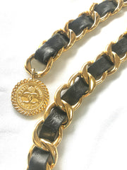 Vintage CHANEL black leather thick chain belt with golden mademoiselle and CC charm. Nice and heavy single layer belt.