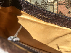 Vintage GUCCI dark brown genuine ostrich leather fisherman bag style shoulder bag with logo embossed motif. Rare masterpiece.