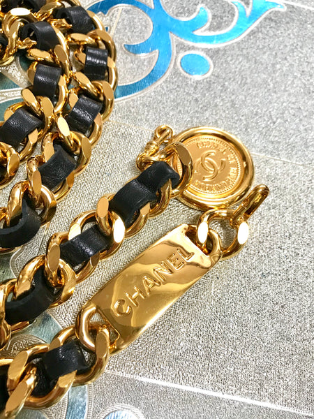 Vintage CHANEL golden thick chain belt with logo engraved bar motifs and a  round charm to the end. Must have gorgeous accessory.