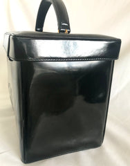 Vintage CHANEL patent enamel vanity bag, lunchbox shape shoulder bag with golden circle CC motif. Lady Gaga style.