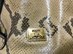 Vintage MOSCHINO by redwall snakeskin print leather mini backpack with golden M logo charm. Perfect chic and mod daily bag.