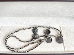MINT. Vintage CHANEL skinny silver chain necklace with symbolic coin charms and black leather. Can be bracelet too.